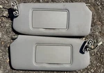 2007-2012 Nissan Sentra Driver & Passenger Side Lighted Sun Visors Gray Oem. Fixed Price $116.10.